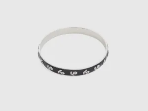 Silver Finish Black Bangle with White Flower Motif and Secure Clasp